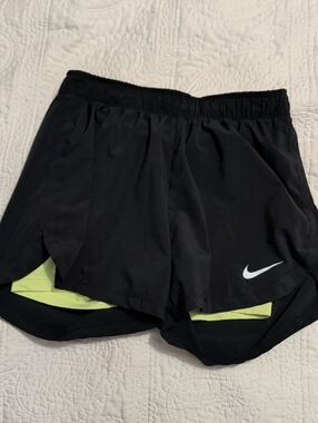 Nike Women's Black Athletic Shorts with Neon Yellow Liner